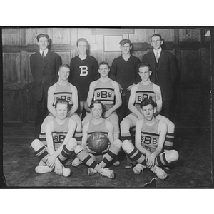 Basketball players posing for a team photo