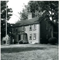 Jason Russell House, with boy and flagpole