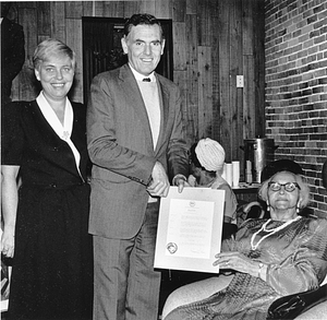 Mayor Raymond L. Flynn and wife Kathy Flynn presenting award to unidentified woman