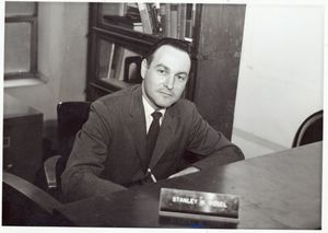 Suffolk University Professor Stanley M. Vogel (CAS) - Department Chair - English, seated behind desk