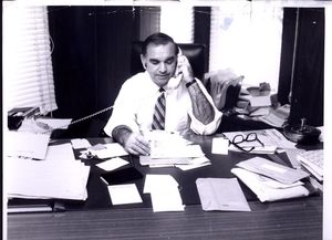 John Joseph Moakley sitting at his desk, on the phone, 29 June 1970