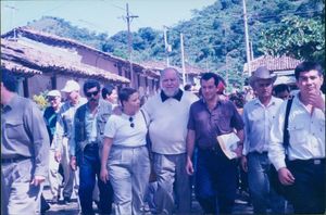 John Joseph Moakley walking through town with others during a visit to Santa Marta, El Salvador, 17 November 1997