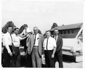John Joseph Moakley (second from left) and William M. Bulger (second from right) meeting at site with Metropolitan District Commission (MDC) officials, 1966