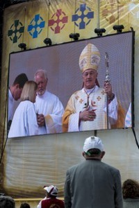 Papal Legate, His Eminence Marc, Cardinal Ouellet, holding his crozier, shown on the large screen beside the altar, as he spoke after Mass at the 2012 50th Eucharistic Congress, Final Day Ceremony, 17th June, at Croke Park GAA Stadium, Dublin
