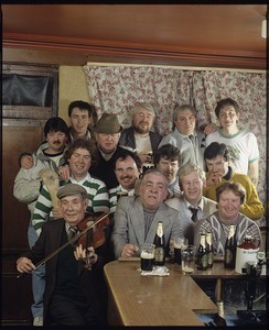 Local characters (including Lester Tumilty), drink and sing in a Downpatrick pub