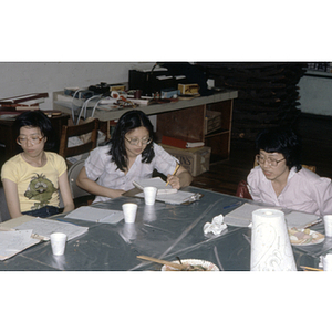 Suzanne Lee speaks to other members of the Chinese Progressive Association during a meeting at their office