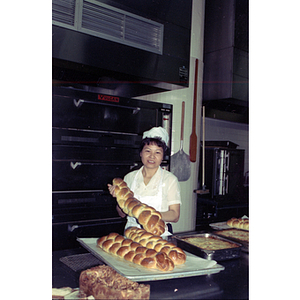 Baker at Andy's Garment Workers Food Service Graduation