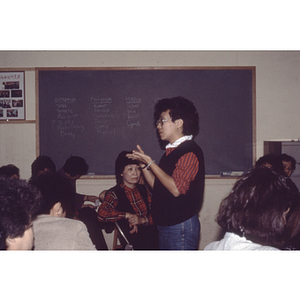 Garment workers meeting in a classroom