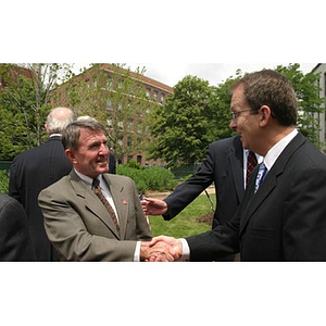 William Bartolini shakes hands with General Richard Neal at the Veterans Memorial groundbreaking ceremony