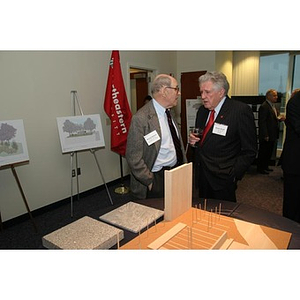 Bernard Solomon and Dennis Picard converse at the Veterans Memorial dinner