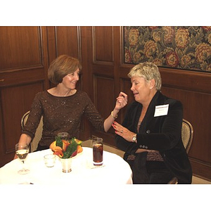 Two women at the gala dinner honoring John Hatsopoulos for his establishment of a scholarship program