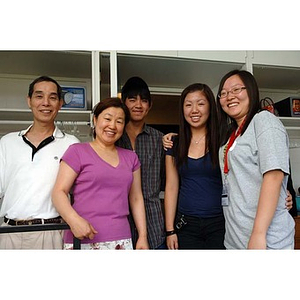 Qinrui Pang poses with four others during move-in