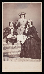 Group portrait of Isabella Pelham Curtis (standing), Frances Greely Stevenson (seated on the left) and "Aunt Margarite" (seated on the right), location unknown