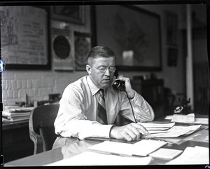 T. J. S. Boake on the phone