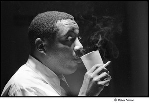 United States Student Press Association Congress: Dick Gregory drinking while holding a cigarette