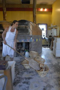 Hungry Ghost Bread: owner and baker Jonathan C. Stevens with fresh-baked bread