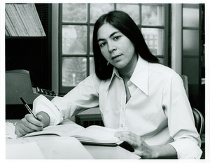 Debra L. Roter seated at desk