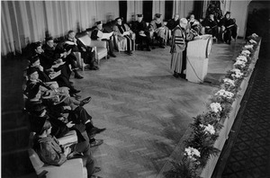 Robert C. Wood speaking from stage podium during his installation into office