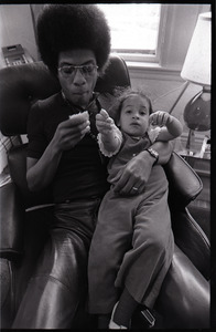 Herbie Hancock eating with daughter Jessica in lap