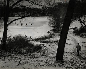Students playing ice hockey on Lake Massasoit