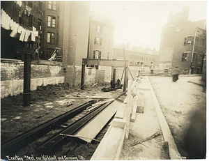 Erecting steel corner Kirkland and Corning Streets