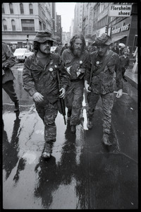 Vietnam Veterans Against the War demonstration 'Search and destroy': veterans walking down Washington Street
