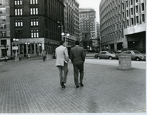 Mayor Raymond L. Flynn walking from Boston City Hall toward Tremont Street with Mayor W. Wilson Goode of Philadelphia