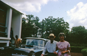 W. E. B. Du Bois and an unidentified woman outside his home in Ghana