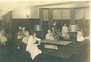 Class of 1923 women relaxing indoors