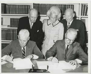 Signing paperwork for the Milbank Research Lab