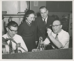 Brazilian ambassador being shown tools