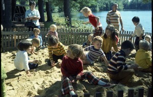 Children playing in a sandbox, Pine Beach