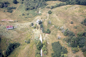 Aerial oblique view north of Andrew Bernardy's, Farm house and dairy barn on 2 Sept 1971.