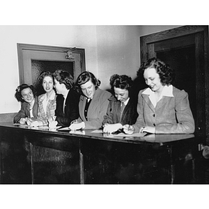 The first six Day College females on registration day