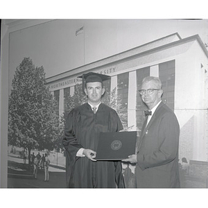 Alfred J. Smith congratulates his son Roy at Northeastern's June 14 commencement exercises