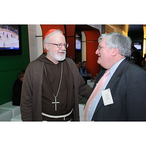 Vincent Lembo and Cardinal O'Malley talking at the Beanpot Reception