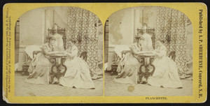 Stereograph of two women using a planchette in a parlor