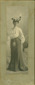 Full-length portrait of unidentified woman, standing, facing front, location unknown, ca. 1890