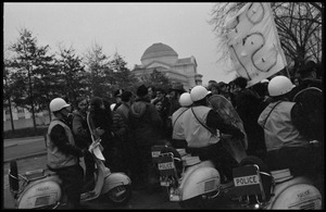 Motorcycle police hemming in demonstrators during the Counter-inaugural demonstrations, 1969, against the War in Vietnam