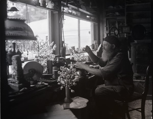 Charles Coffin, The Maine Hermit, painting fake flowers for sale to tourists