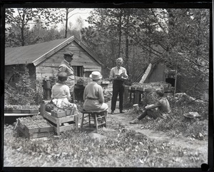 Walter H. Heath, self-proclaimed "Poet of Monadnock," reading to a group outdoors