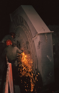 Two workers welding