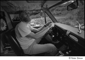 Ram Dass in his van: Ram Dass in the driver's seat