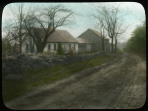 Roadside view- unidentified (stonewall, house and barn along road)