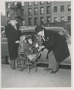 Patient Michael Kaplan with new company car at Christmas