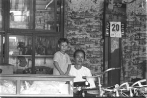 American war baby in Tay Ninh shop.
