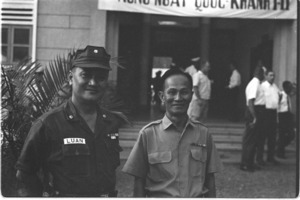 Commander Le van Luan (deputy of Saigon police) chief with Hoa van Muoi.