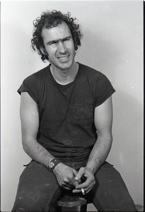 Studio portrait of Richard Safft, seated on a stool