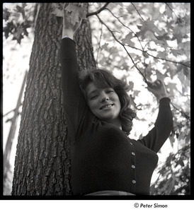 Lucy Simon with arms raised