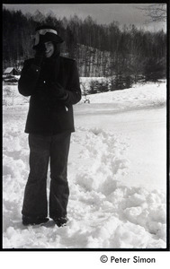 Woman standing in the deep snow